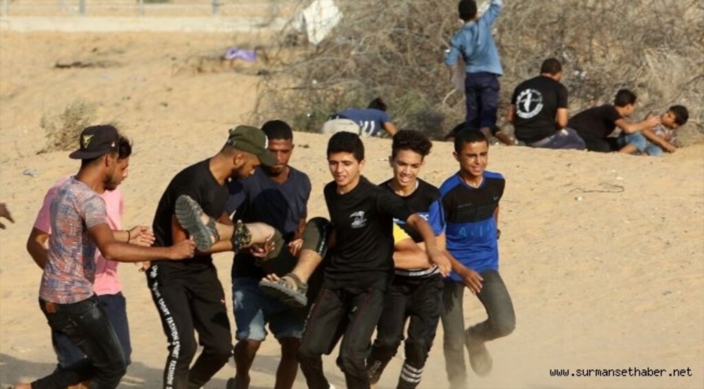 İsrail askerleri Gazze sınırında 74 Filistinliyi yaraladı